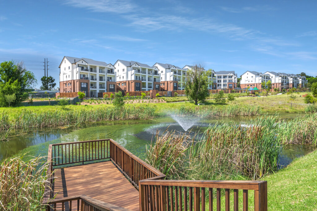 The Reid, Sandton, view of the green spaces on the property and the apartment blocks.